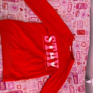 bright red crew neck with pink and white letters